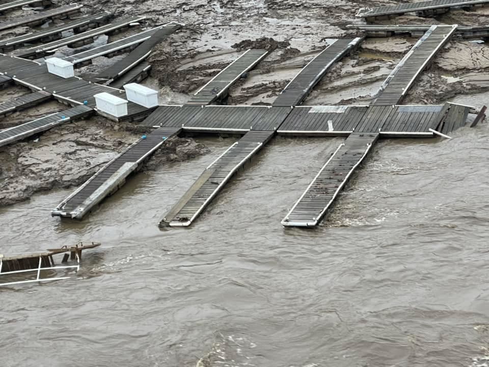 Docks twisted and displaced by floodwaters